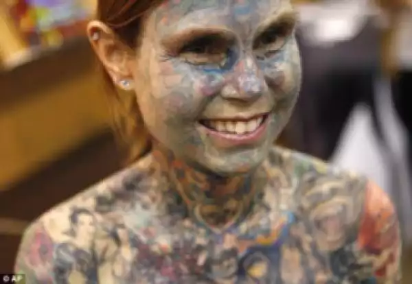 SEE Woman Who Makes Guinness Book Of Record As The Most Tattooed Woman In The World
